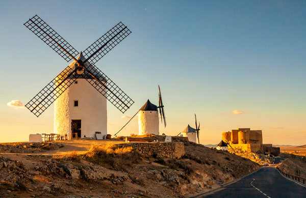 Spanish windmills and medieval castle on a hill in Consuegra,Toledo, Spain