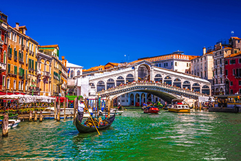 Gondola on Grand Canal near Rialto Bridge, Venice, Italy